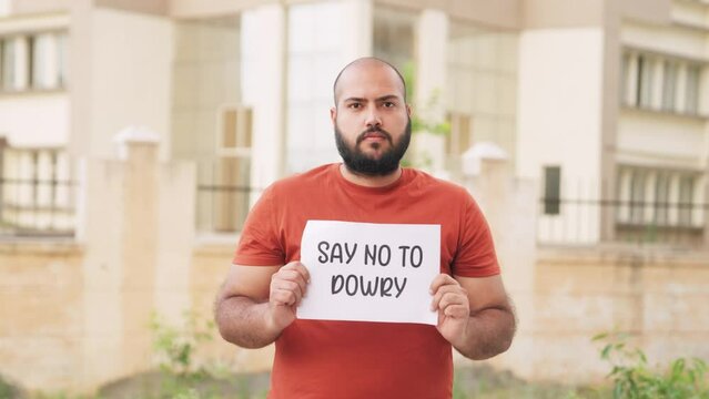 Bald indian Man Holding Say No To Dowry