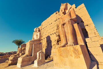 Statues of seated pharaohs. The Precinct of Amun-Re, the Karnak Temple, Luxor, Egypt