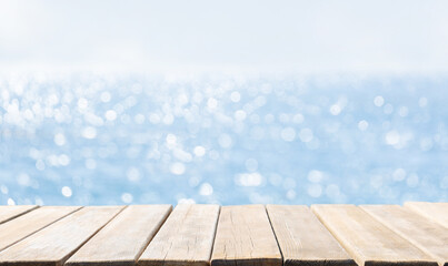 Empty old wooden table and  and blurred sea background
