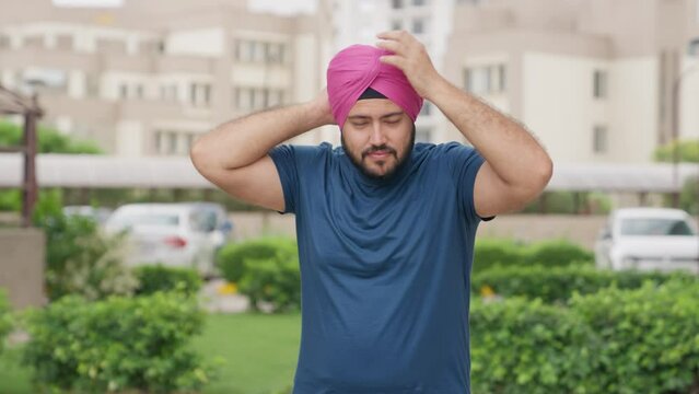 Sikh Indian Man Setting Turban,  Pagdi