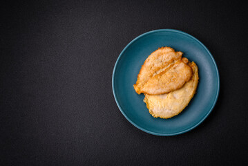 Delicious battered chicken breast chops with salt, spices and herbs