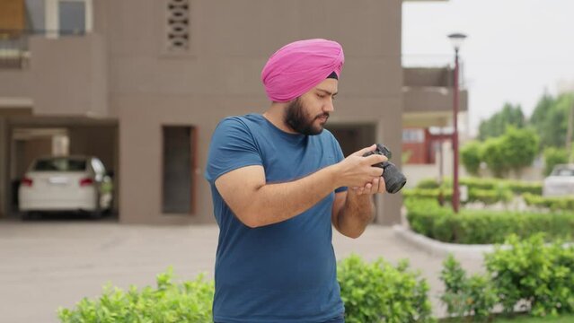 Sikh Indian Man Clicking Picture with Camera