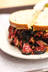 Sandwich with pastrami and mustard 