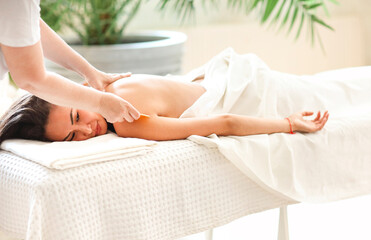 Obraz na płótnie Canvas Gua sha massage or beauty treatment in spa salon