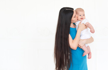 Mother holding sweet baby boy