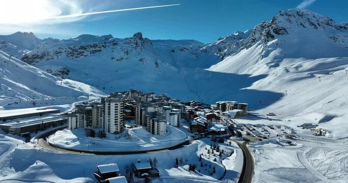 Winter drone shot of ski pistes and slopes covered with fresh powder snow in Tignes in Valdisere France