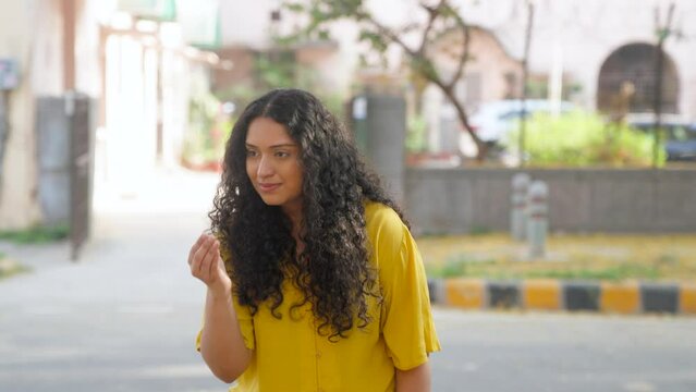 Indian Girl with Curly Hair Greeting Adab