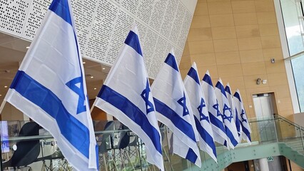 Israeli Flags Displayed on Balcony in Event Hall – Celebratory and Patriotic Decoration