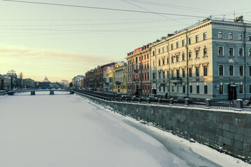 Snowy embankment with residential houses, Saint-Petersburg, Russia