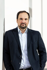 Portrait of young middle aged businessman in formal suit. Happy confident business man male person....