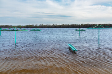 The Dnieper River overflowed its banks in spring and flooded the beach Kremenchuk city, Ukraine