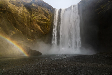 A rainbow and Skogafoss waterfall in Iceland.