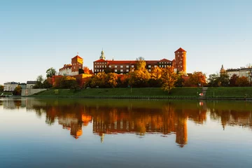Zelfklevend Fotobehang Wawel castle famous landmark in Krakow Poland. Landscape on coast river Wis © alexanderuhrin
