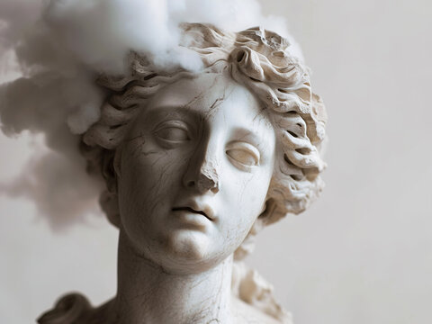 Antique sculpture of woman surrounded with clouds