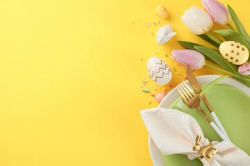 Joyful Easter moments: celebrating renewal and rebirth. Top view photo of plates, cutlery, napkin,...