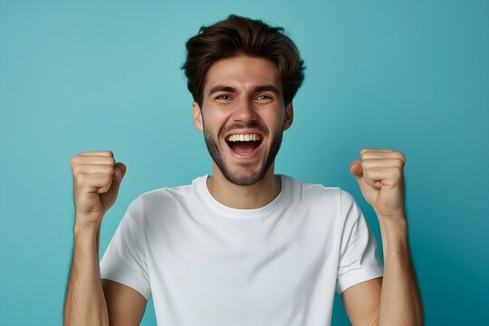 Dynamic business emotion: Cheerful entrepreneur shouts in triumph against a serene pastel blue background. A captivating image of victory and elation.