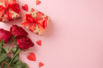 Conveying sentiments with Valentine's Day gifts. Top view shot of gift boxes, paper hearts, red...