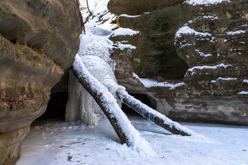 Frozen waterfall in Kaskaskia canyon on a frigid winter morning.  Starved Rock state park,...