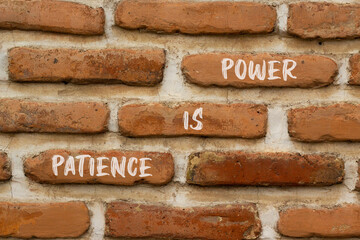 Patience is power symbol. Concept words Patience is power on beautiful brown brick. Beautiful brown...