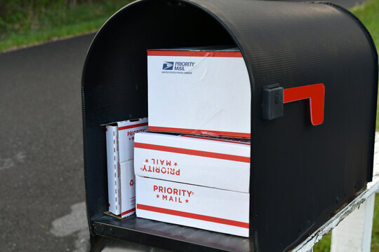 USPS United States Postal Service Priority Mail boxes in a mailbox 