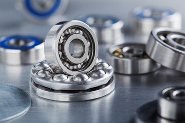 different bearings on a metal background. Part of mechanism.