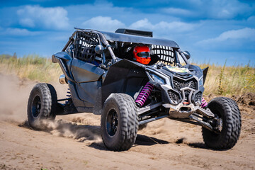 Fototapeta na wymiar UTV buggy offroad vehicle racing on sand. Extreme, adrenalin. 4x4.