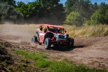 ATV and UTV riding in sandy dusty track. Amateur competitions. 4x4.