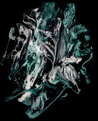 Vibrant, colorful and fluid abstract paint texture on a black background in a modern and contemporary style with shades of green, white, black