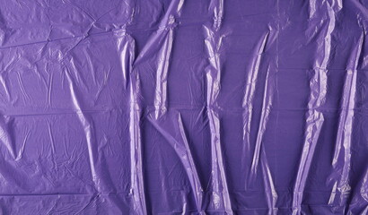 Lilac plastic wrinkled bag texture and background