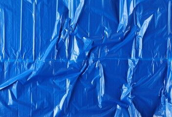 Blue plastic wrinkled bag texture and background