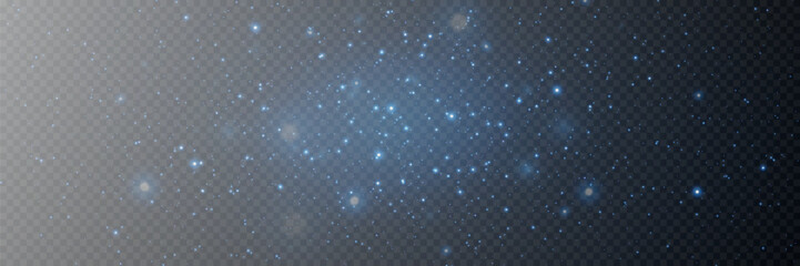 Sparkles of fairy dust and blue stars shine with a special light. Particles of glare of light.