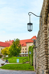 The courtyard is buried in flowers and greenery in the ancient Zamek Krolewski na Wawelu Castle in the center of Krakow.