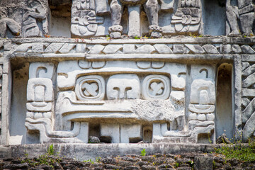 Mayan ruins and stone carvings at the XUNANTINICH (Stone Lady) Mayan Temple in Belize Central...