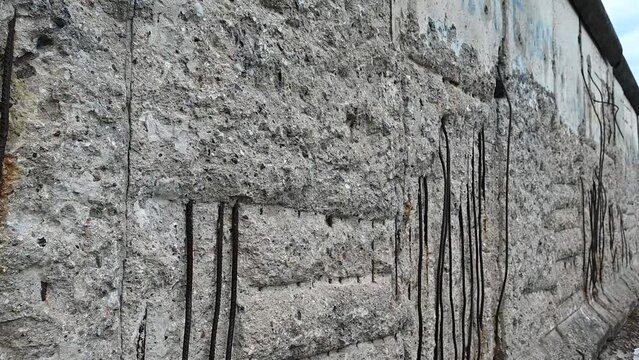 Berlin, Germany, August 10, 2023. Close-up conceptual image footage of a section of the Berlin Wall at the Topography of Terror museum.