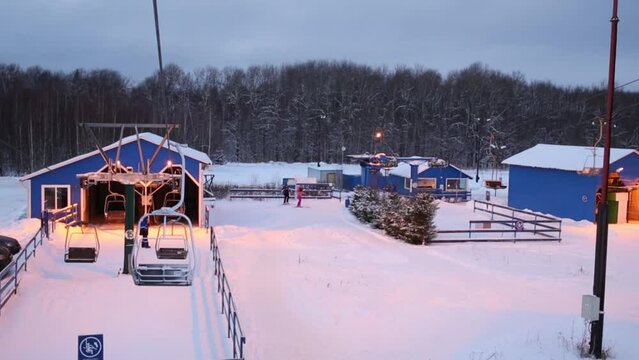 Movement of modern ropeway - end at winter evening