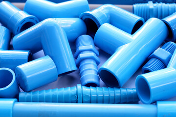 Blue pvc pipe connections for plumbing work. Plumber equipment
