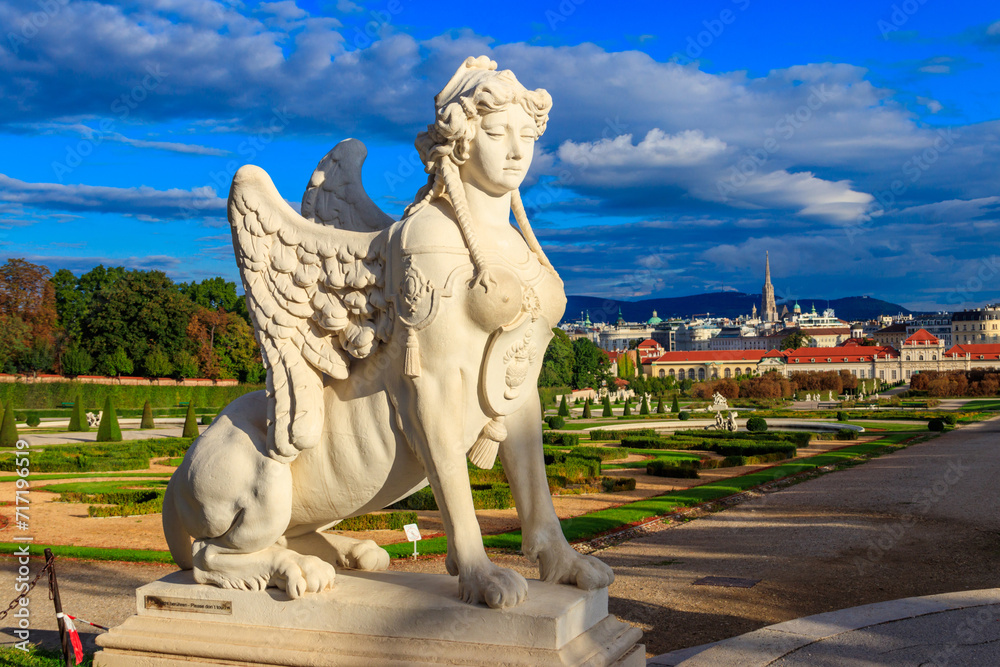 Wall mural statue of sphinx in the gardens of upper belvedere palace in vienna, austria