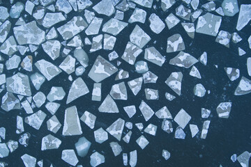 Ice floes in the Baltic Sea, close-up photo, drone view.