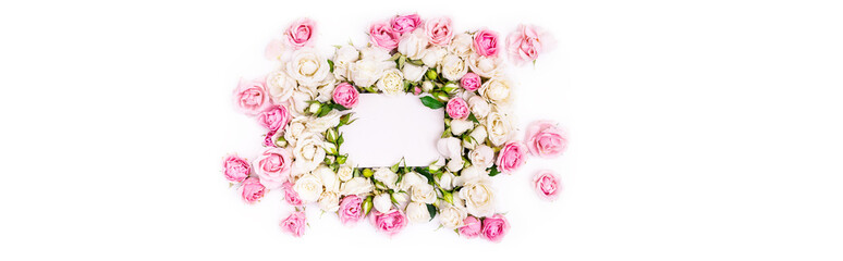 Obraz na płótnie Canvas Blank note paper decorated flowers frame, white and pink roses