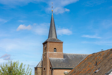 Fototapeta na wymiar The church tower of Sint Paulus Bekering (Sint-Paulusbekeringkerk) in small town village in southern of Holland, Epen is a village in the southern part of the Dutch province of Limburg, Netherlands.