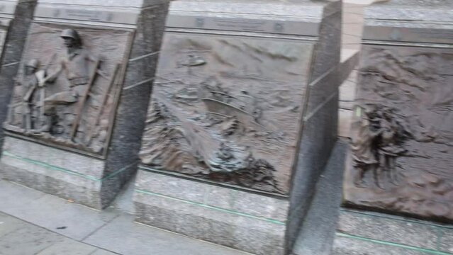 Many planches with subject of war in the street.