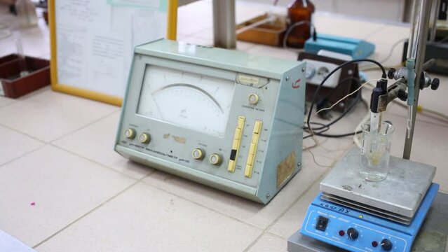 Magnetic stirrer with heating, millivoltmeter in chemical laboratory