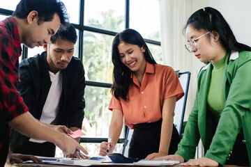 Multiethnic business people working together in the office, Corporate business team and manager in a meeting, A group of business people partners during a set team meeting in the modern office.
