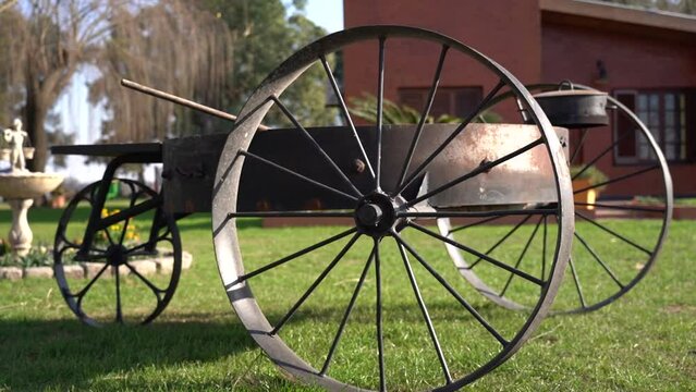Antique barbecue grill in the shape of a carriage