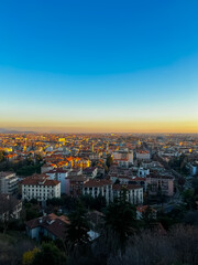 Sunset over the city of Bergamo. View from Citta Alta Bergamo, Italy