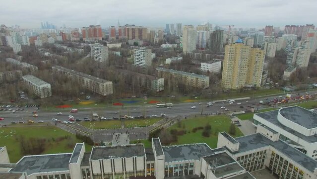 Edifice of MGIMO on street with city traffic. Aerial view