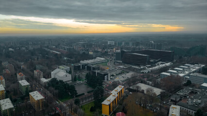 Cityscape top view. Italian city view from a drone Sunset in cloudy weather, view from a drone of...