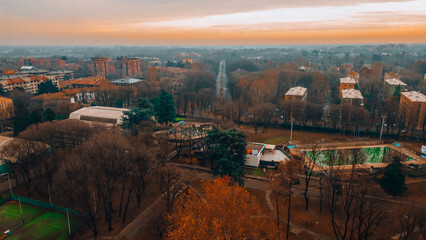 Cityscape top view. Italian city view from a drone Sunset in cloudy weather, view from a drone of...