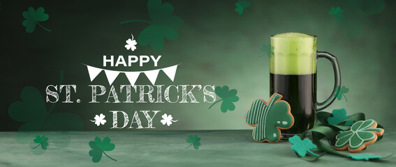 Mug of beer and cookies in shape of clover on green background. Banner for St. Patrick's Day celebration