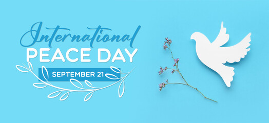 Paper dove on color background. International Day of Peace